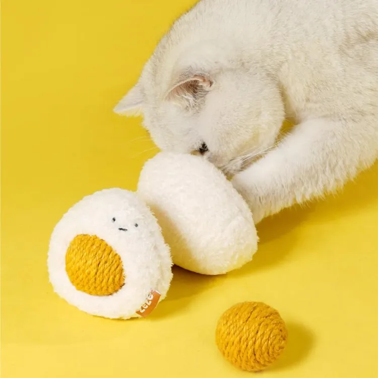 Sunny-Side Up Purr-bo cat toy with a rattling yolk and catnip in both separable parts.