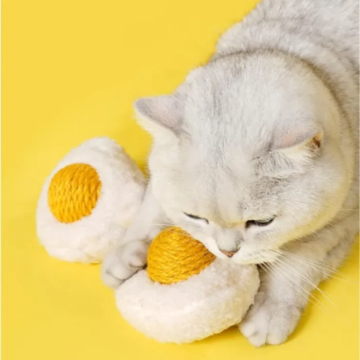 Sunny-Side Up Purr-bo cat toy with a rattling yolk and catnip in both separable parts.