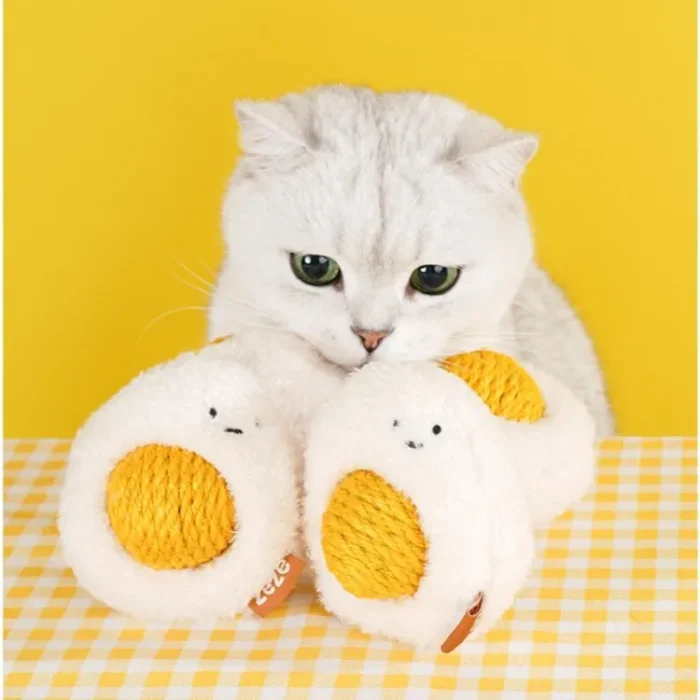 Sunny-Side Up Purr-bo cat toy with a rattling yolk and catnip in both separable parts.