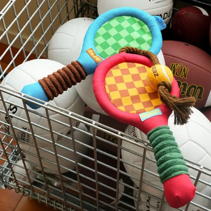 Play fetch and tug-of-war with the "Paw-ltimate Smasher" tennis racket toy. Its reinforced rope and durable chew ball make every interaction fun and perfect for bonding.