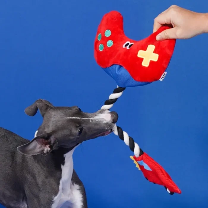 Interactive "Paw Controller" dog toy with chewable tug ropes and squeaky buttons for fetch and tug-of-war games.