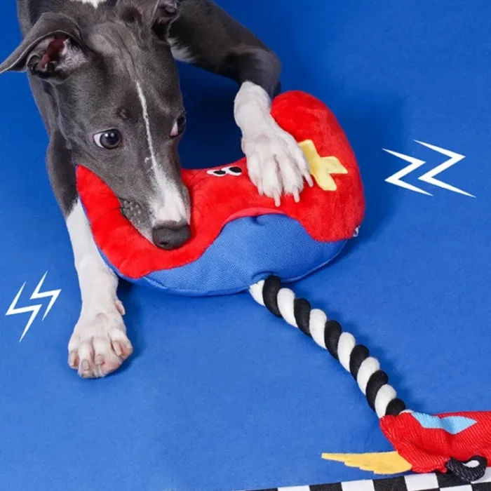 Interactive "Paw Controller" dog toy with chewable tug ropes and squeaky buttons for fetch and tug-of-war games.